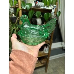 Green medium size hen on nest salt